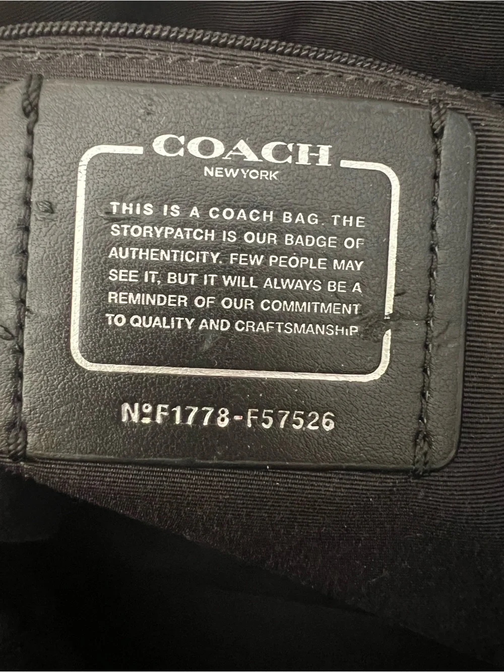 Coach sleek leather